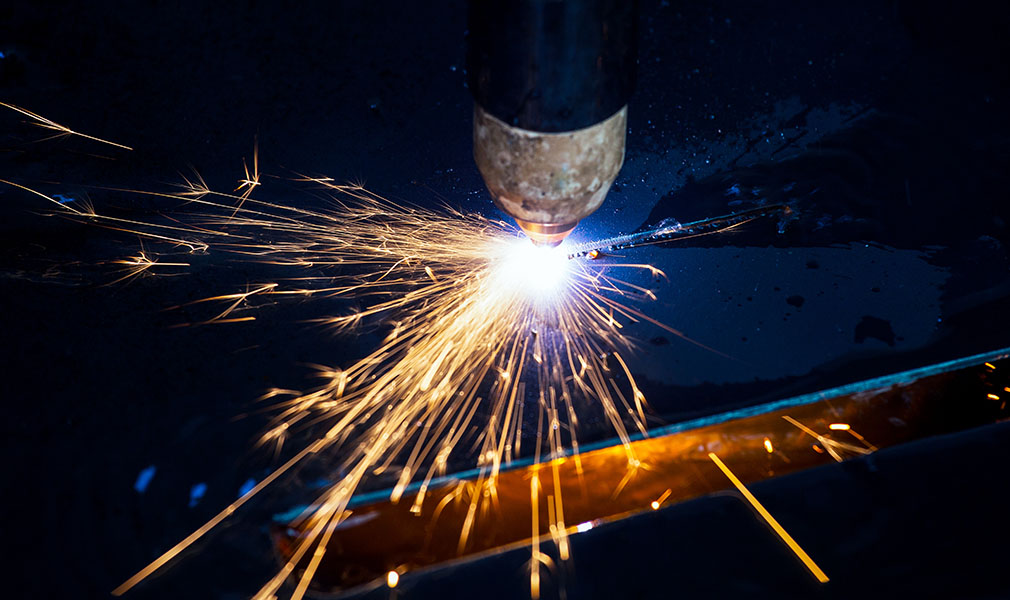 Industrial cnc plasma cutting of metal plate Industrial cnc plasma cutting of metal plate